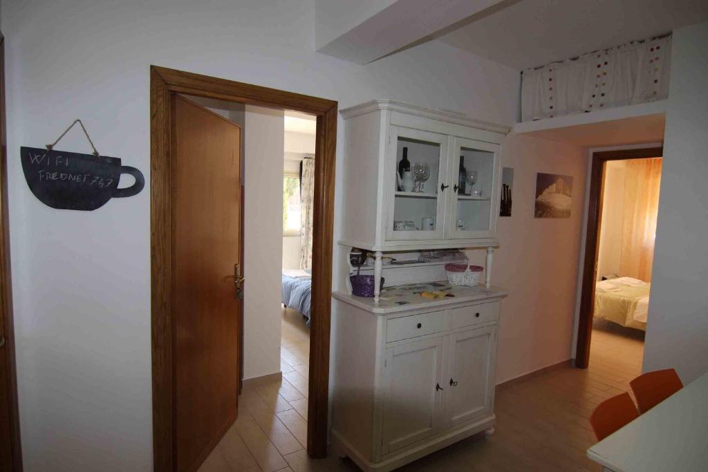 Kuchyň nebo kuchyňský kout v ubytování B&B Le Dune Beach