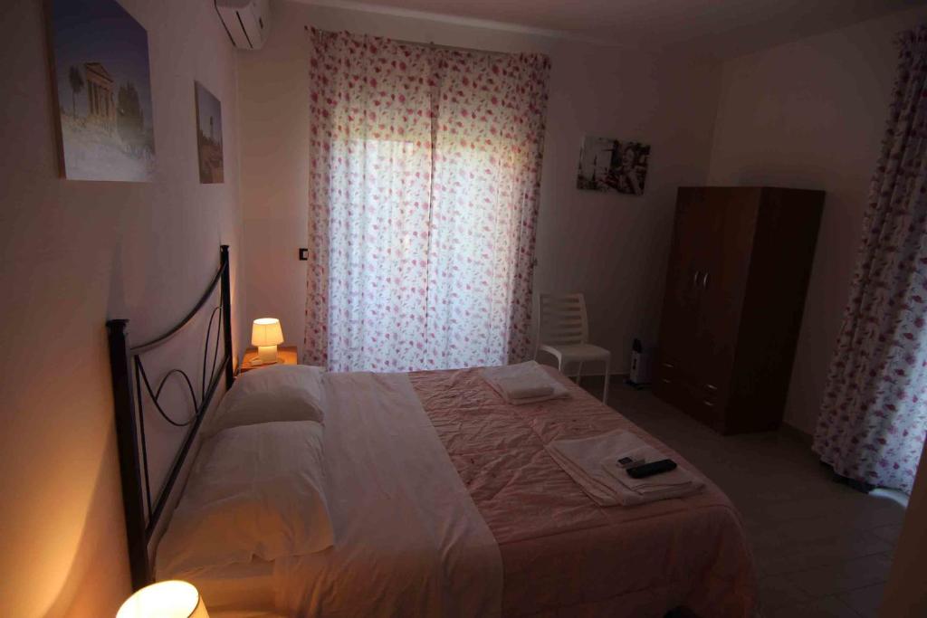 Postel nebo postele na pokoji v ubytování B&B Le Dune Beach