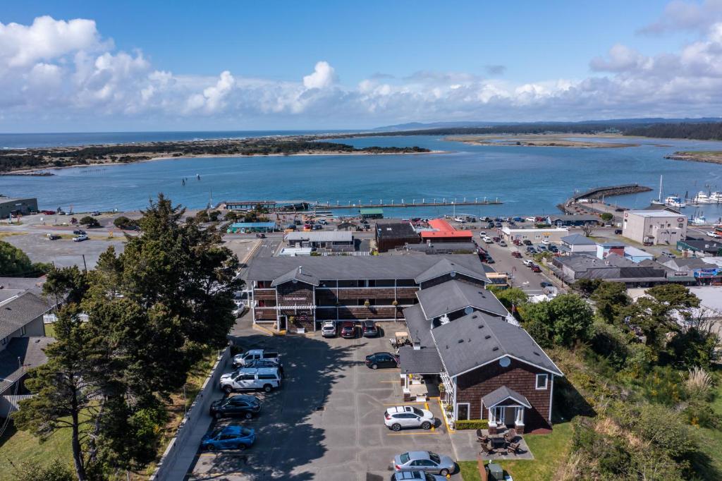 an aerial view of a marina with cars parked at Bandon Inn in Bandon