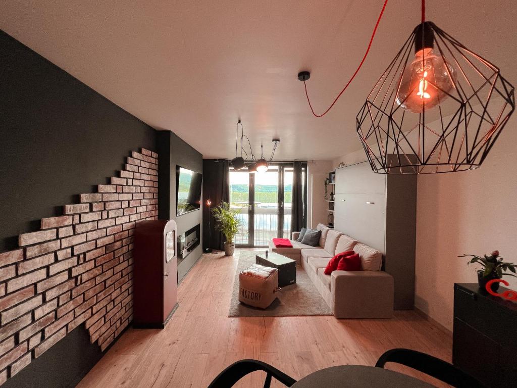 Posezení v ubytování Industrial Apartment in Belval the University City