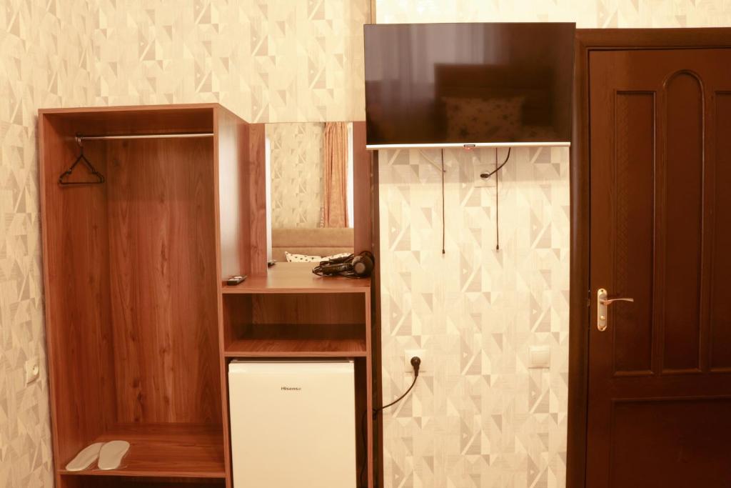 Kuchyň nebo kuchyňský kout v ubytování Styopa Hotel