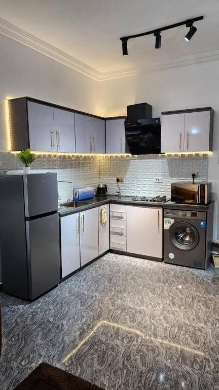 Kuchyň nebo kuchyňský kout v ubytování Keev Homes & Apartments Shortlet