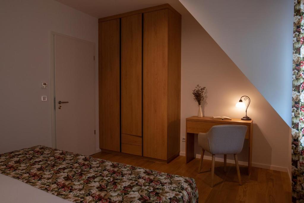 Postel nebo postele na pokoji v ubytování Vierseitenhof Appartements