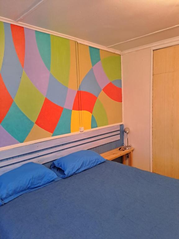 Uma cama ou camas num quarto em Isla Yu Patagonia 2