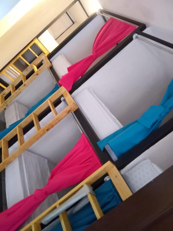 Palanda nebo palandy na pokoji v ubytování Casa Escalante Hostel