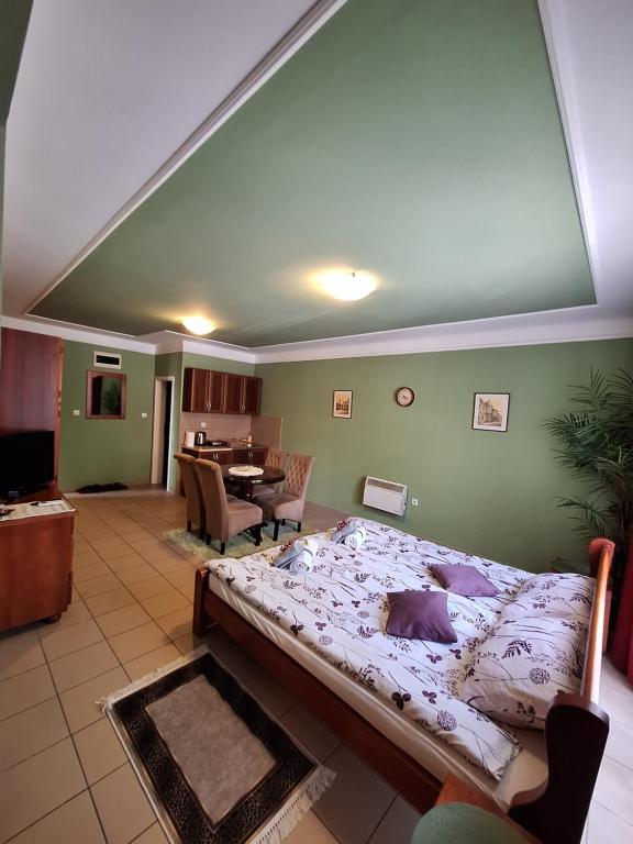 Postel nebo postele na pokoji v ubytování Guest House Villa Lord