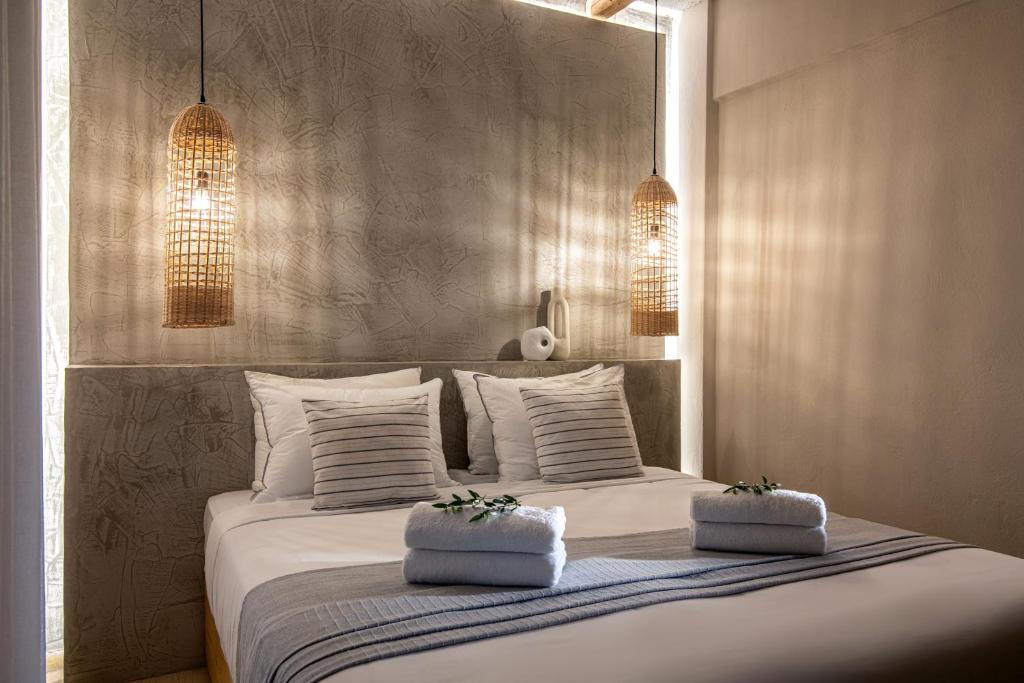 Posteľ alebo postele v izbe v ubytovaní Elèa Concept Hotel & Suites