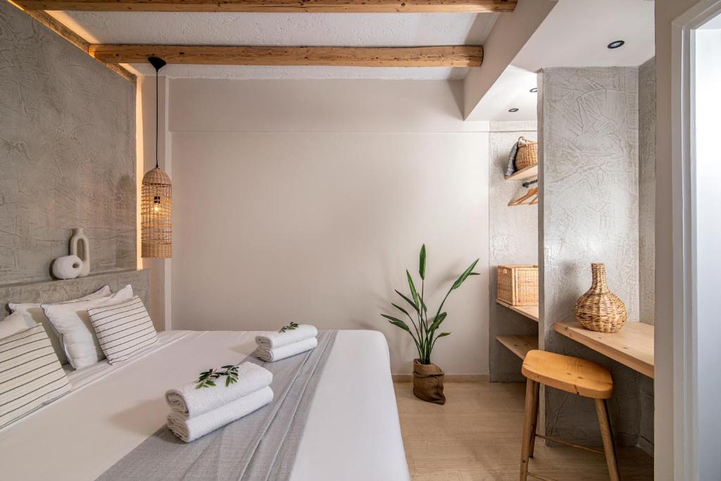 Posteľ alebo postele v izbe v ubytovaní Elèa Concept Hotel & Suites