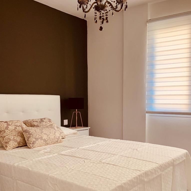 Postel nebo postele na pokoji v ubytování A&F Comfort Modern House