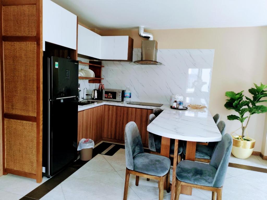 Kuchyň nebo kuchyňský kout v ubytování Mai An Hotel
