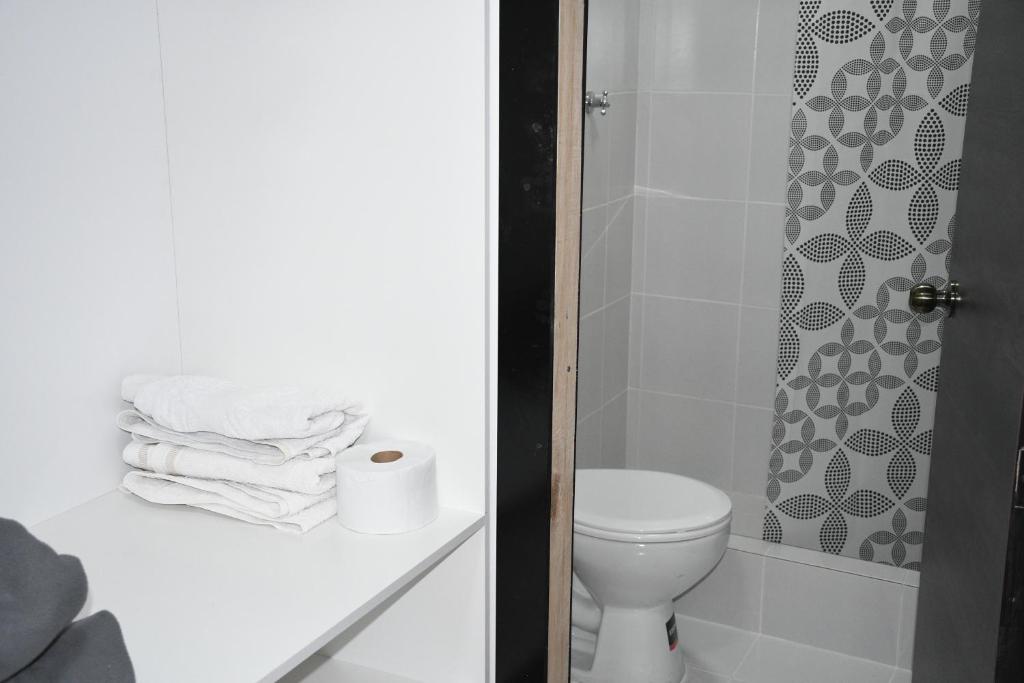 Koupelna v ubytování Habitaciones Alkimya