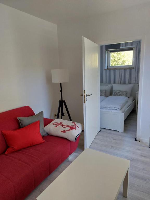 Postel nebo postele na pokoji v ubytování Ferienwohnung Eichhörnchen