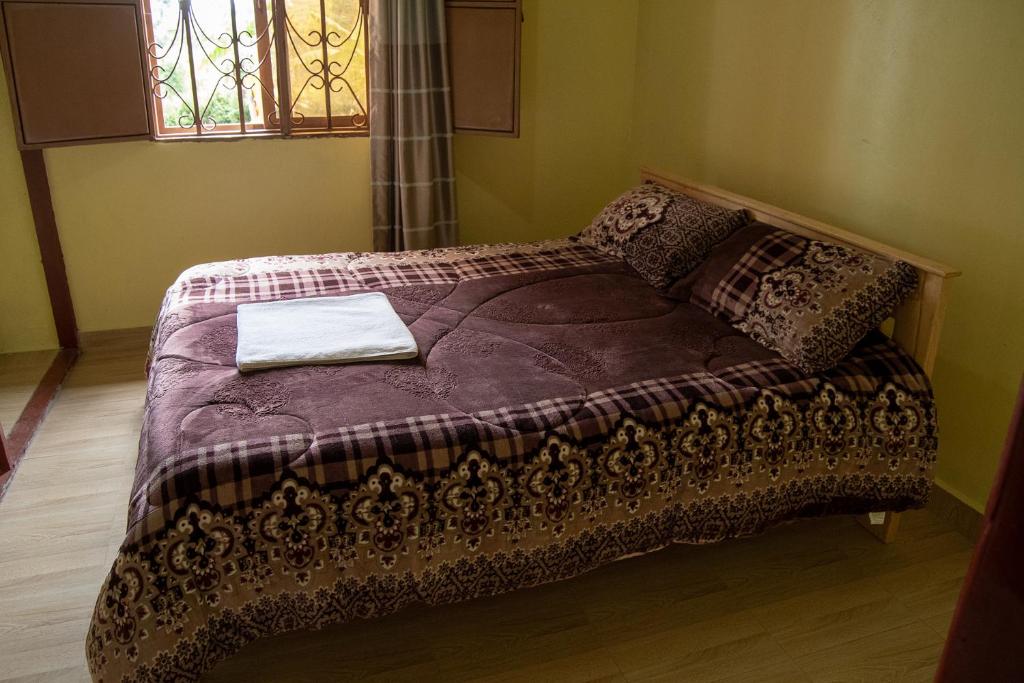 Postel nebo postele na pokoji v ubytování Ntebeko Homestay