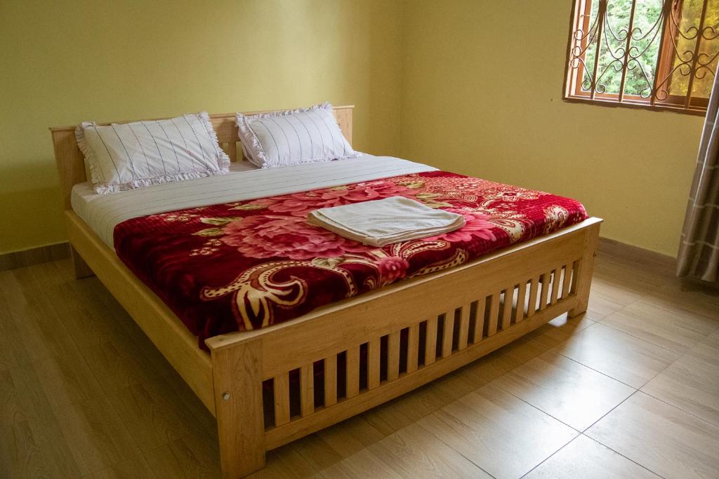 Postel nebo postele na pokoji v ubytování Ntebeko Homestay