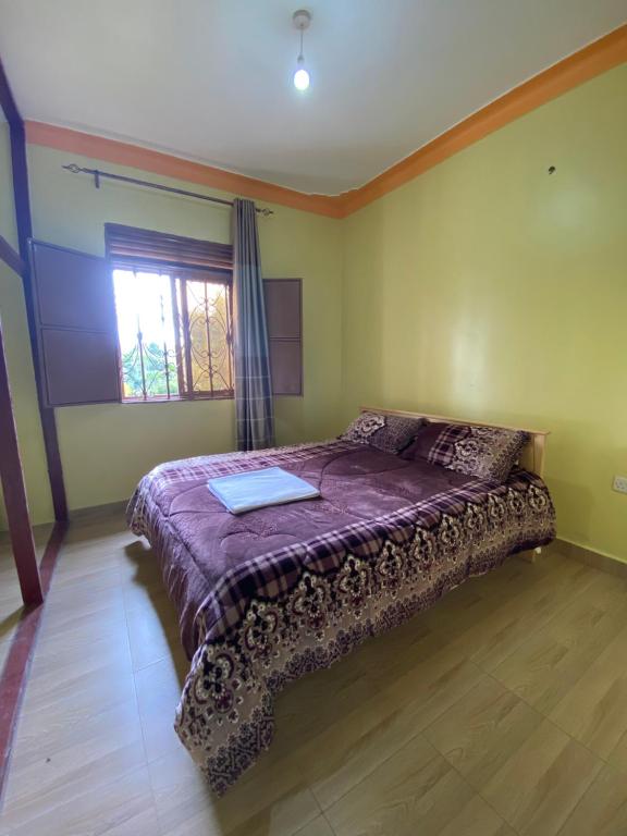 Postel nebo postele na pokoji v ubytování Ntebeko Homestay