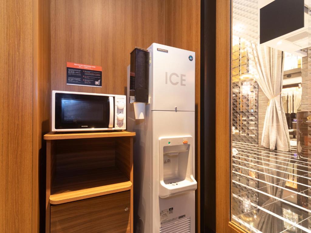 Kuchyň nebo kuchyňský kout v ubytování APA Hotel Namba Shinsaibashi Higashi
