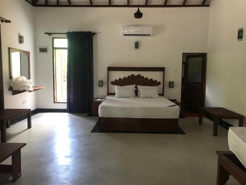 Postel nebo postele na pokoji v ubytování Honeyland hotel