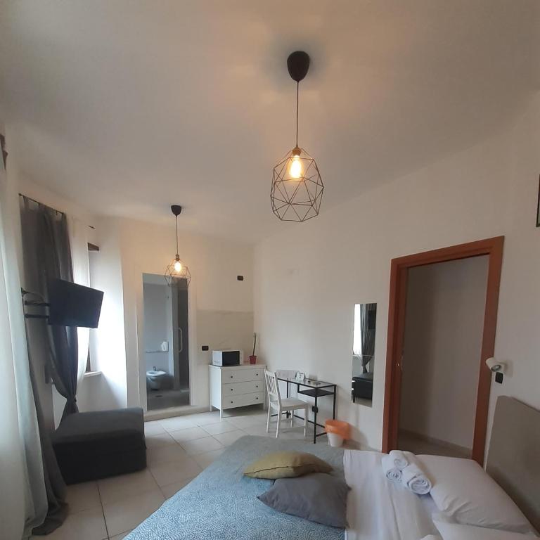 Postel nebo postele na pokoji v ubytování B&B 30 mt dal Duomo