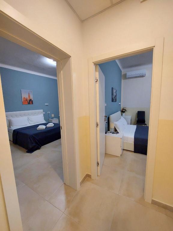 Postel nebo postele na pokoji v ubytování Bonaini Relax B&B