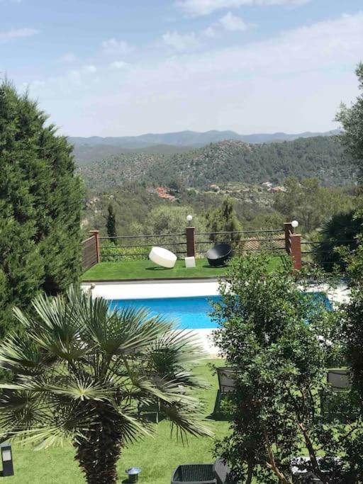 Bazén v ubytování Villa Wanderlust Sitges Hills Exclusive pool only families nebo v jeho okolí