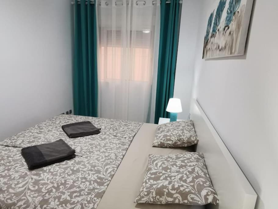 Postel nebo postele na pokoji v ubytování Apartamento Playa Cura