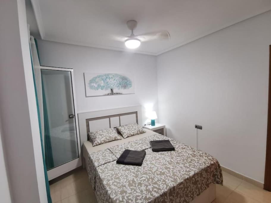 Postel nebo postele na pokoji v ubytování Apartamento Playa Cura