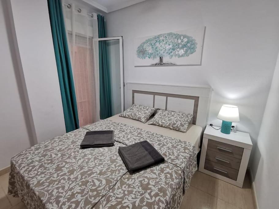 Postel nebo postele na pokoji v ubytování Apartamento Playa Cura