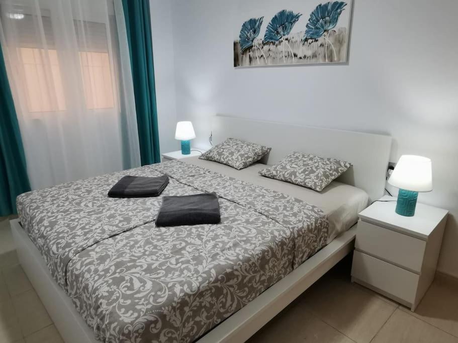 Postel nebo postele na pokoji v ubytování Apartamento Playa Cura