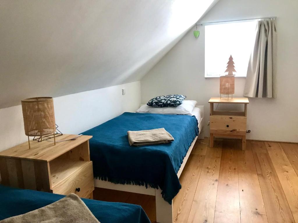 Postel nebo postele na pokoji v ubytování Penzion Kvilda - Luční