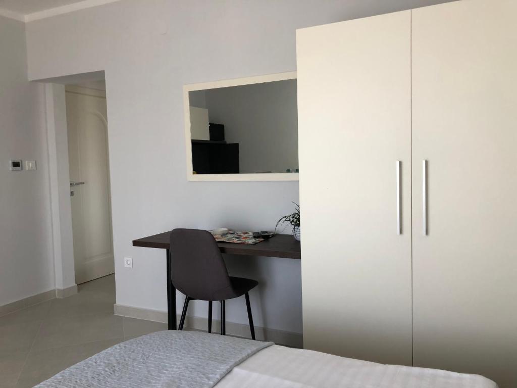 Postel nebo postele na pokoji v ubytování Apartments Aco