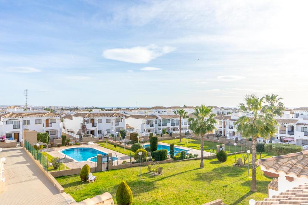 Bazén v ubytování CB Living - Homely apartment Ciñuelica, Punta Prima nebo v jeho okolí