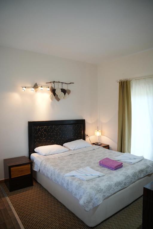 Postel nebo postele na pokoji v ubytování Sofia Residence