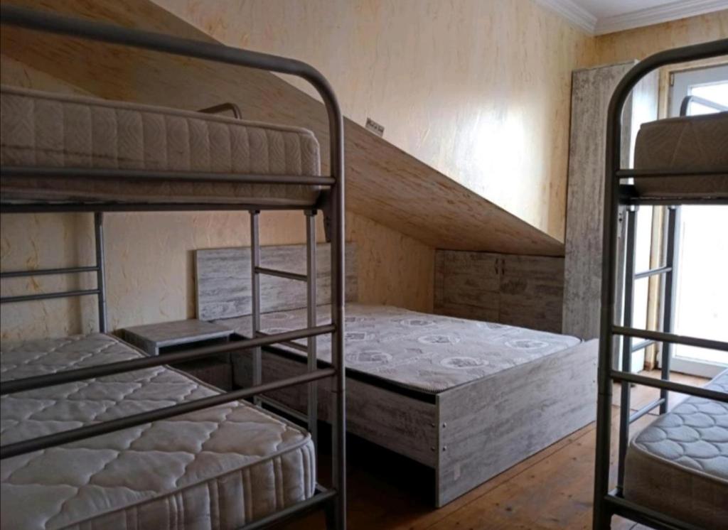 Letto o letti in una camera di Chase Dream Hostel追梦空间