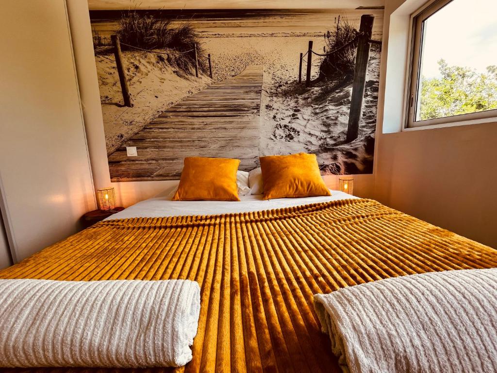 Een bed of bedden in een kamer bij PALAVAS Acces direct plage LM Sud