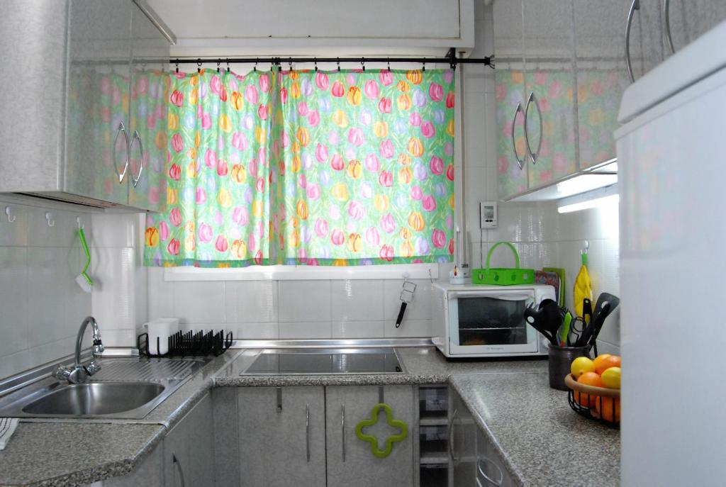 Kuchyň nebo kuchyňský kout v ubytování Coronado 124 Apartment Casasol