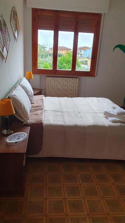Postel nebo postele na pokoji v ubytování Latte e Menta
