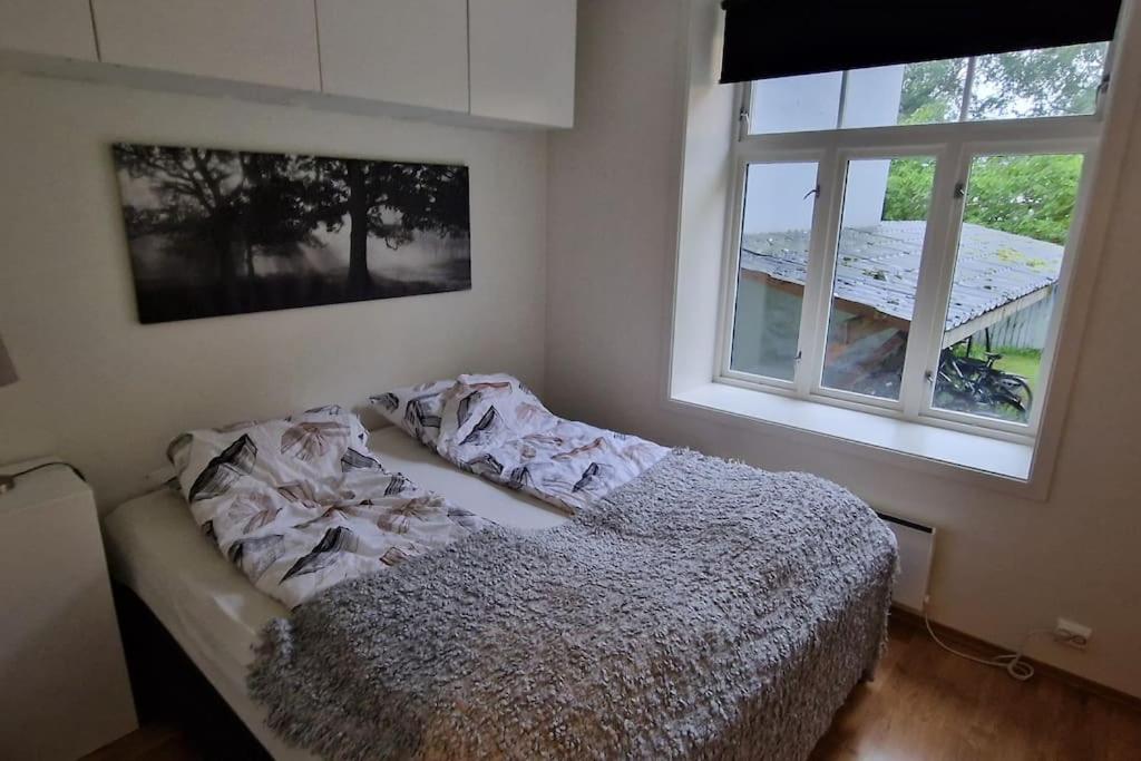 Postel nebo postele na pokoji v ubytování Leilighet sentralt i Trondheim