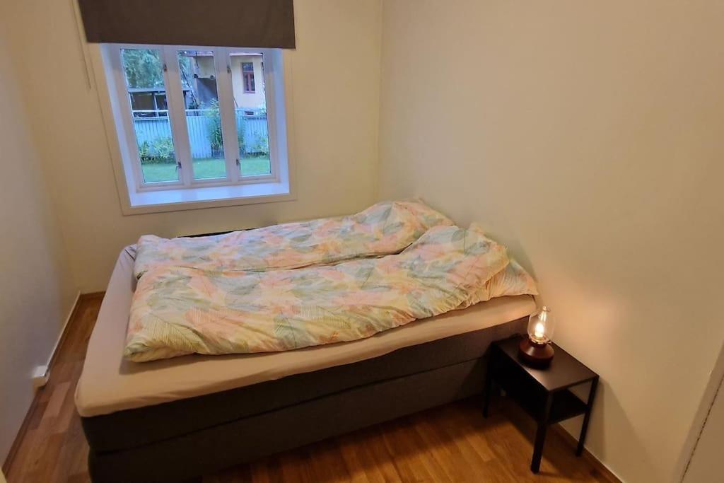 Postel nebo postele na pokoji v ubytování Leilighet sentralt i Trondheim