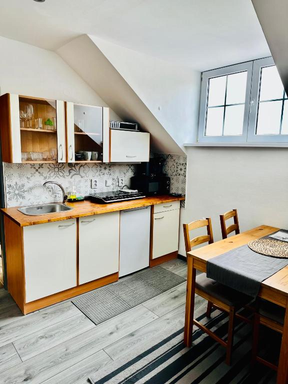 Kuchyň nebo kuchyňský kout v ubytování Apartmány na Horce