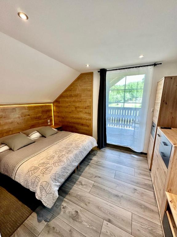 Postel nebo postele na pokoji v ubytování Apartmány na Horce