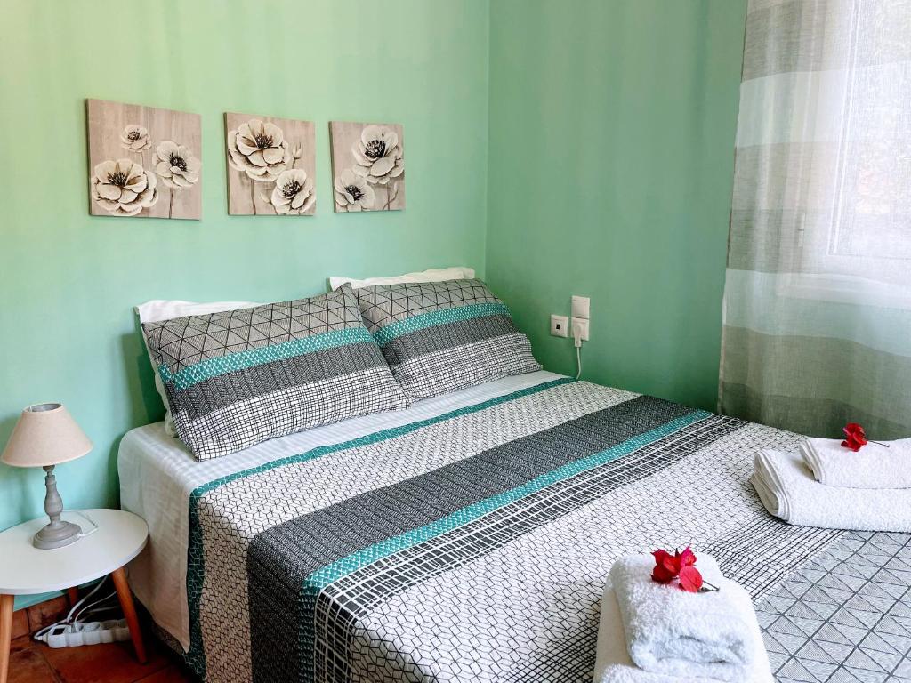 A bed or beds in a room at Villa Pigi