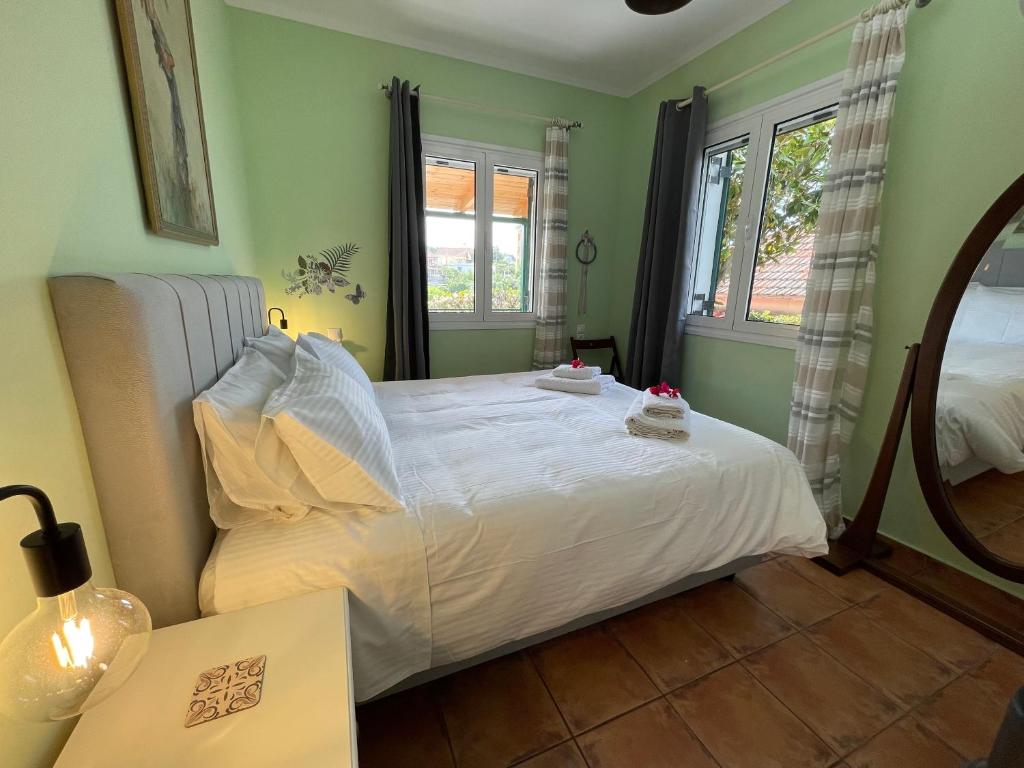 A bed or beds in a room at Villa Pigi