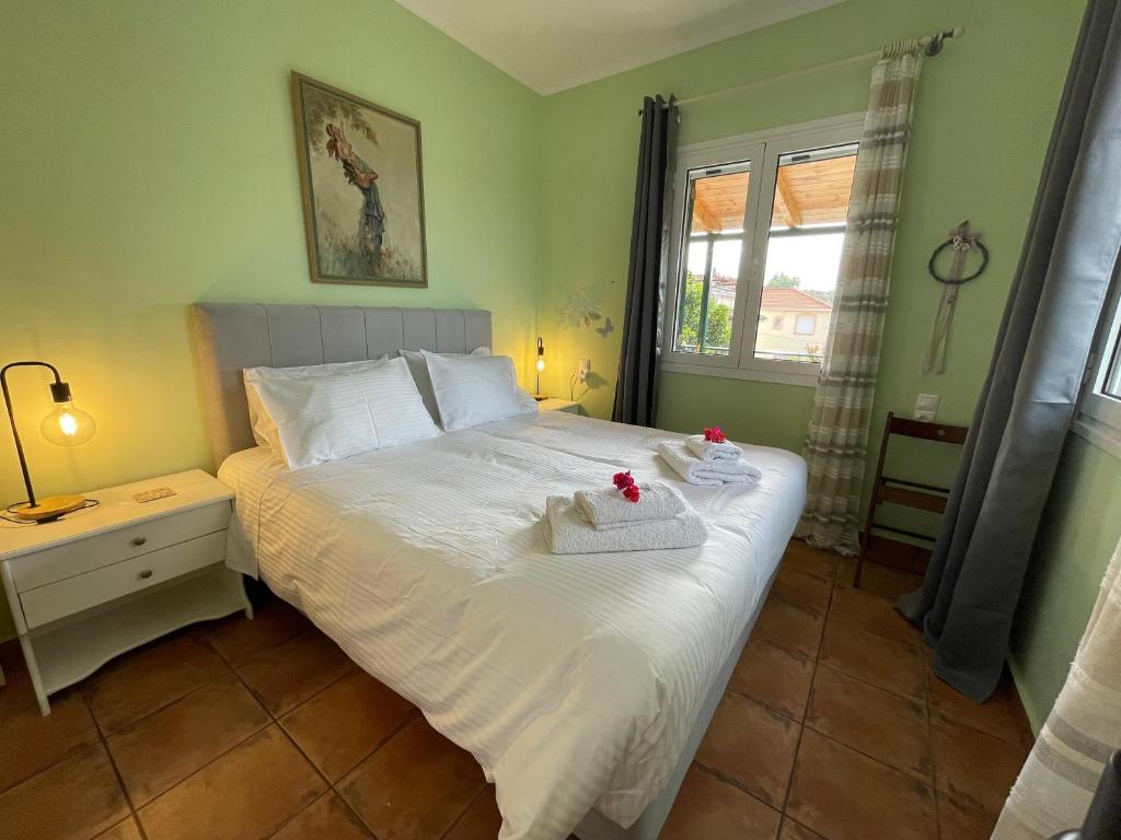 A bed or beds in a room at Villa Pigi
