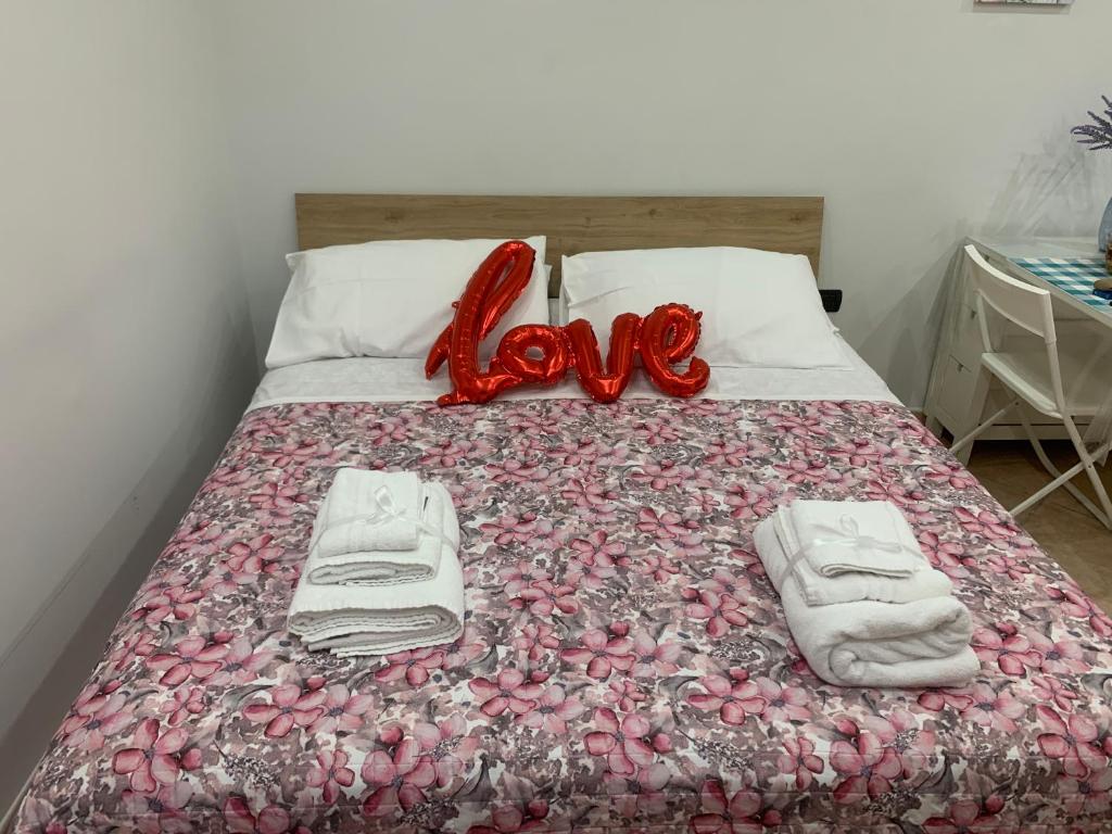 A bed or beds in a room at San Ciro's apartment