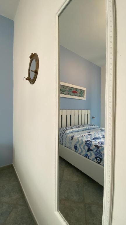 Postel nebo postele na pokoji v ubytování Sunrise B&B Le castella