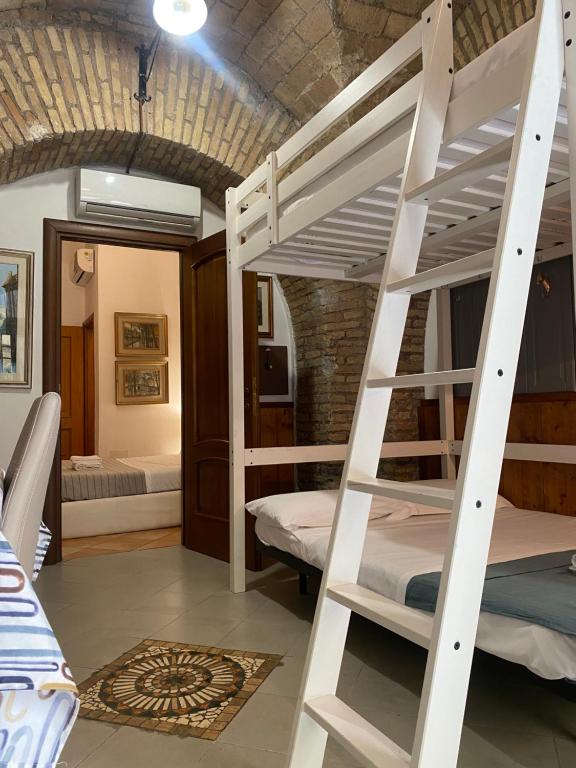 Posteľ alebo postele v izbe v ubytovaní mini Apartment