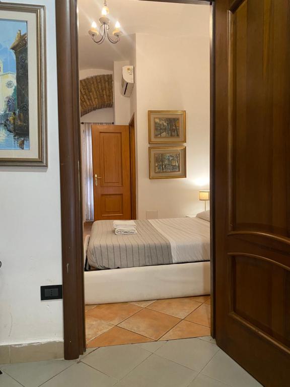 Posteľ alebo postele v izbe v ubytovaní mini Apartment