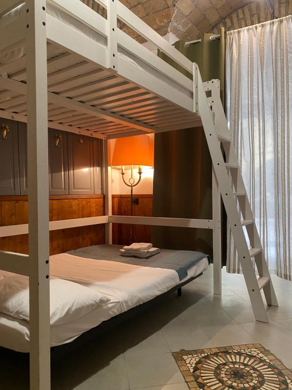 Posteľ alebo postele v izbe v ubytovaní mini Apartment