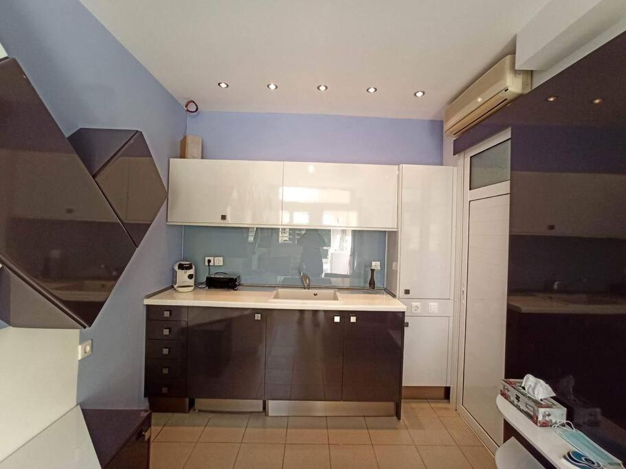 Kuchyň nebo kuchyňský kout v ubytování Takis & Machi house