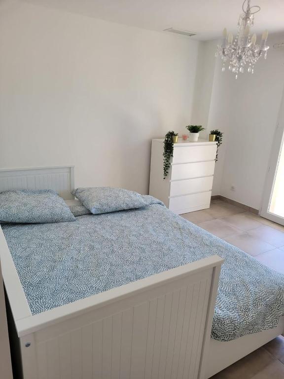 Posteľ alebo postele v izbe v ubytovaní Chambres & Suites Villa architecte